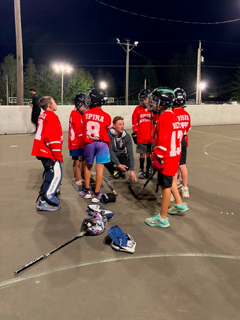 A team huddle on the rink